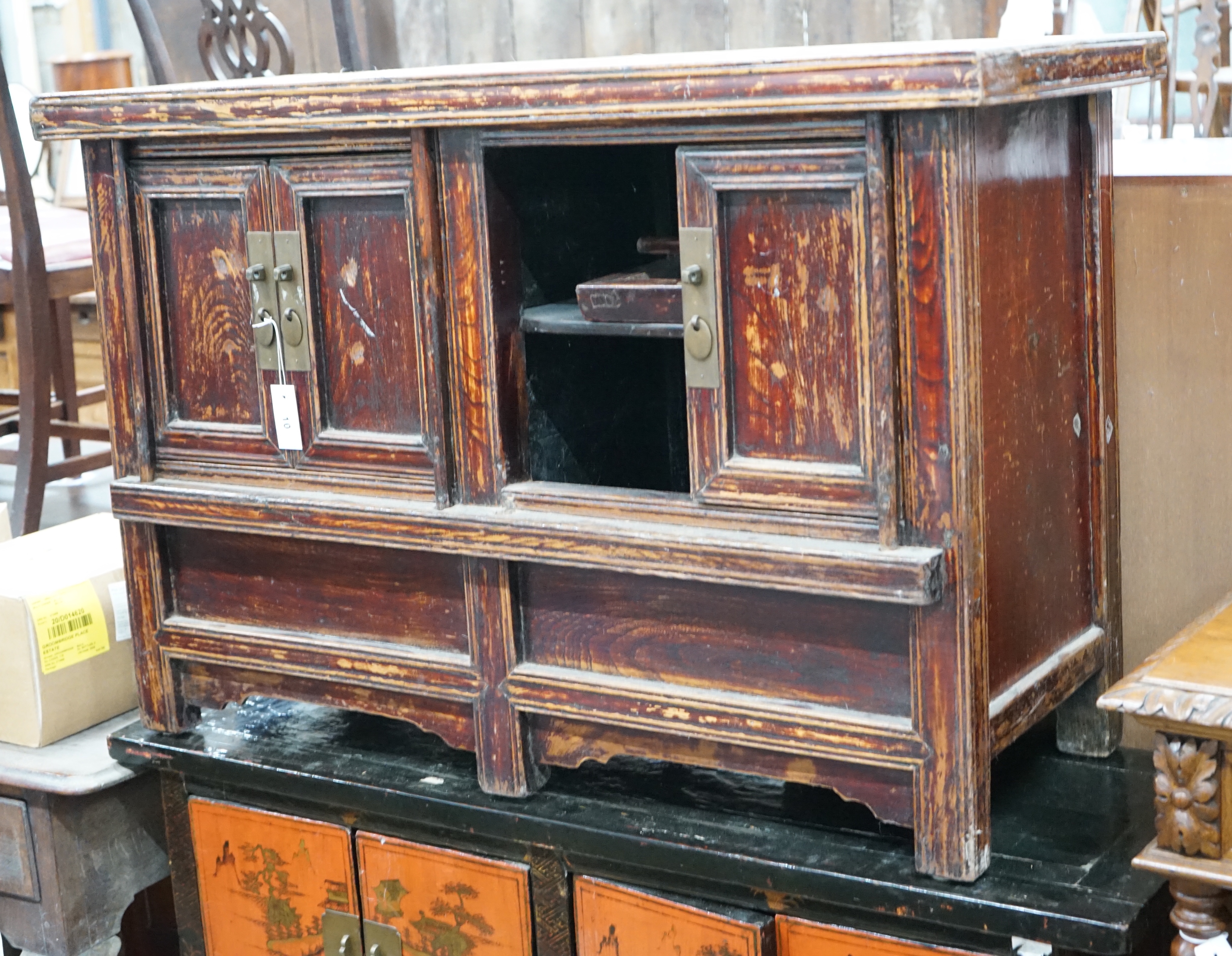 A Chinese caned pine low cabinet, width 116cm depth 48cm height 76cm